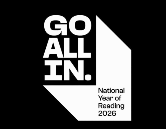 Bold white text on a black background reads GO ALL IN. Next to it, inside a white geometric shape, is smaller text: National Year of Reading 2026.